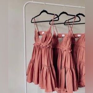 Her entire name says Grace open back pink baby doll lace, mini dress